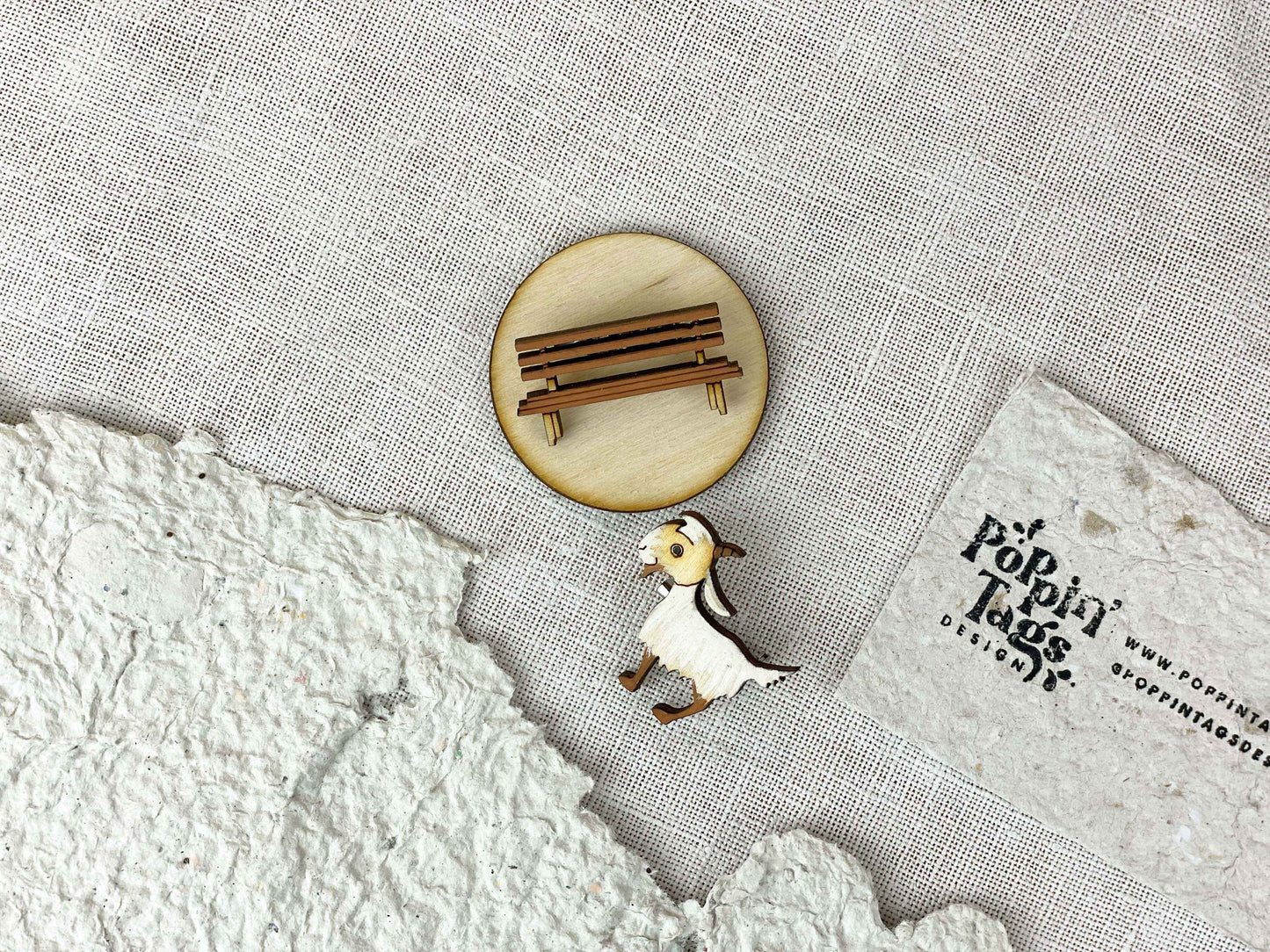 Paired Brooches: the Goat and the Bench