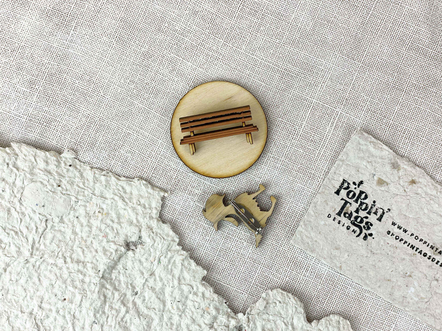 Paired Brooches: the Goat and the Bench