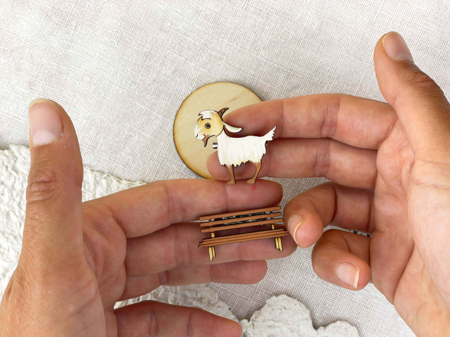 Paired Brooches: the Goat and the Bench