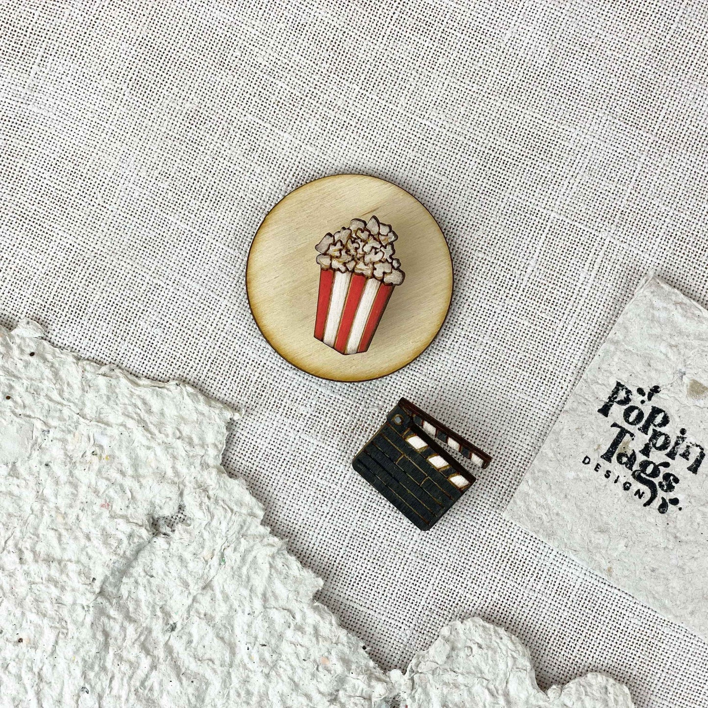 Paired Brooches: Cinema