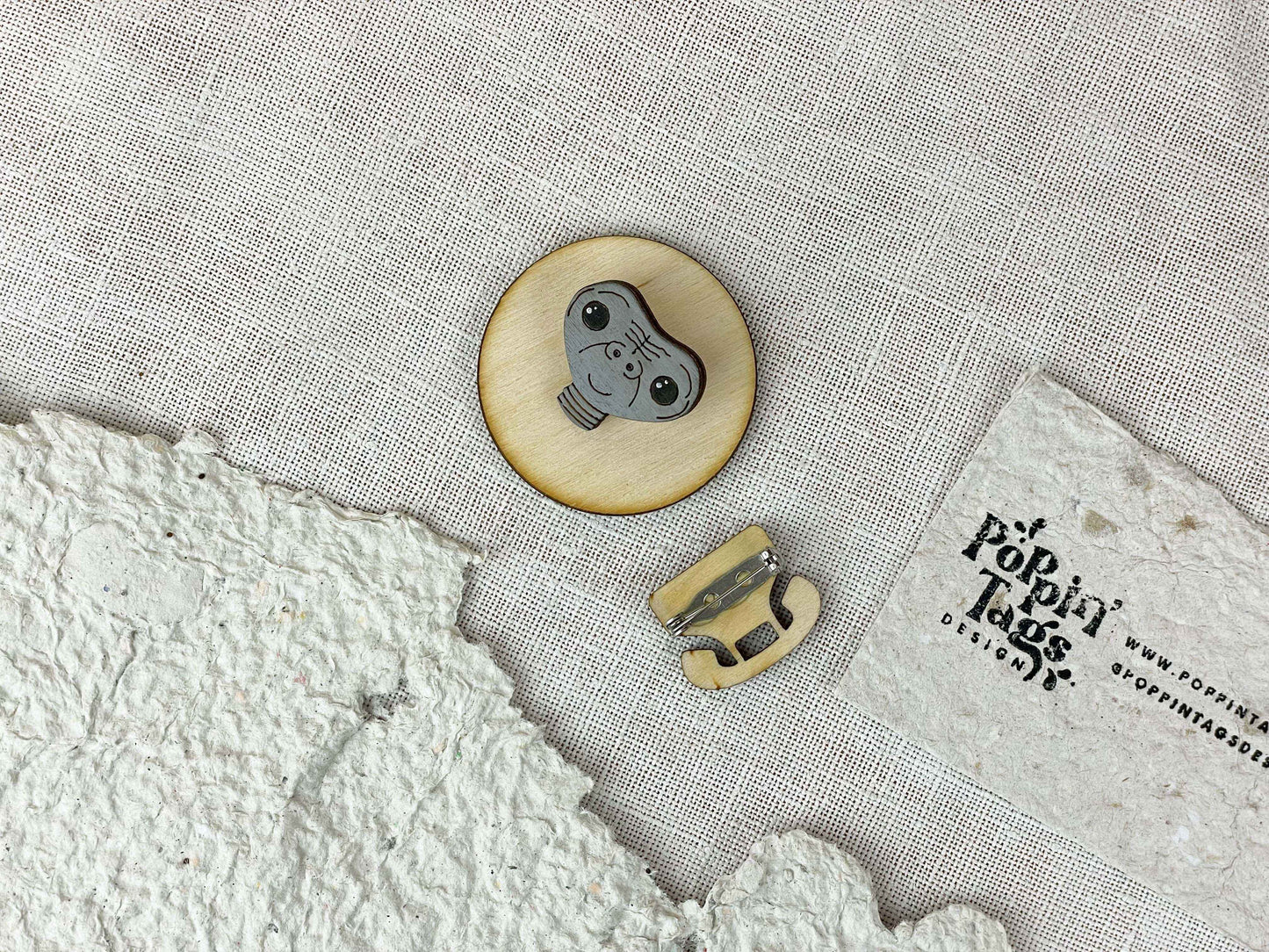 Paired Brooches: E.T.