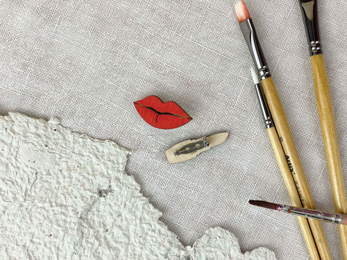 Paired Brooches: Lipstick