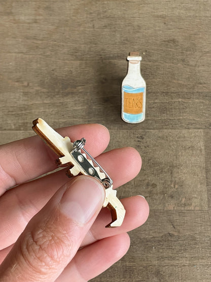 Paired Brooches: Crocodile Tears