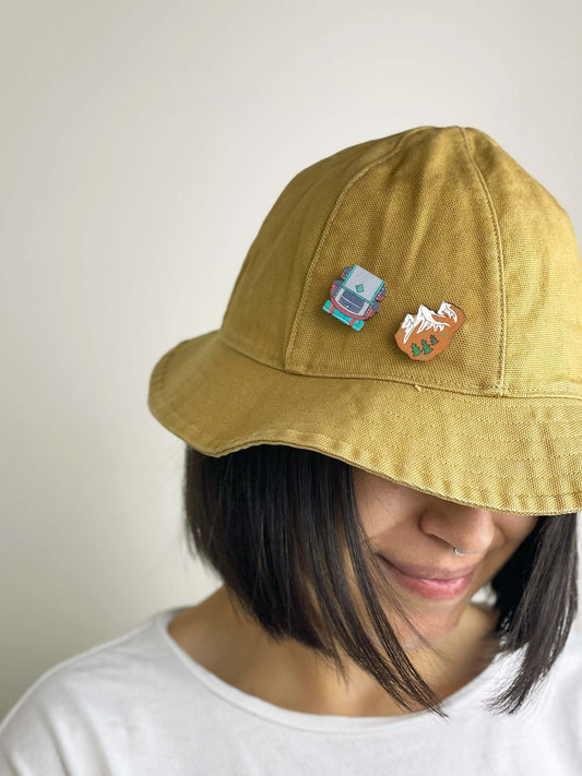 Paired Brooches: Backpacker